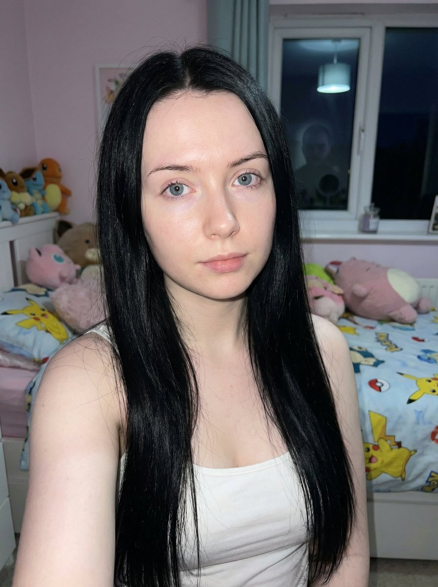 Photorealistic Portrait: Young Woman, Black Hair, Blue Eyes Nano Banana提示词