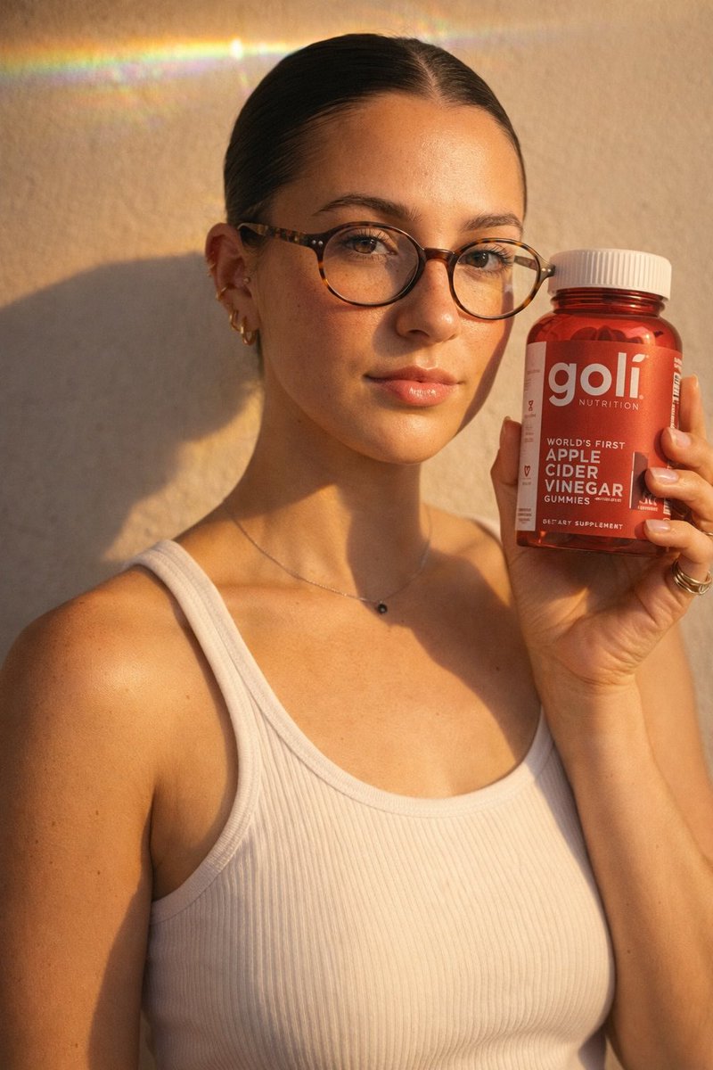 Woman with Goli Apple Cider Vinegar Gummies - Golden Hour Nano Banana提示词