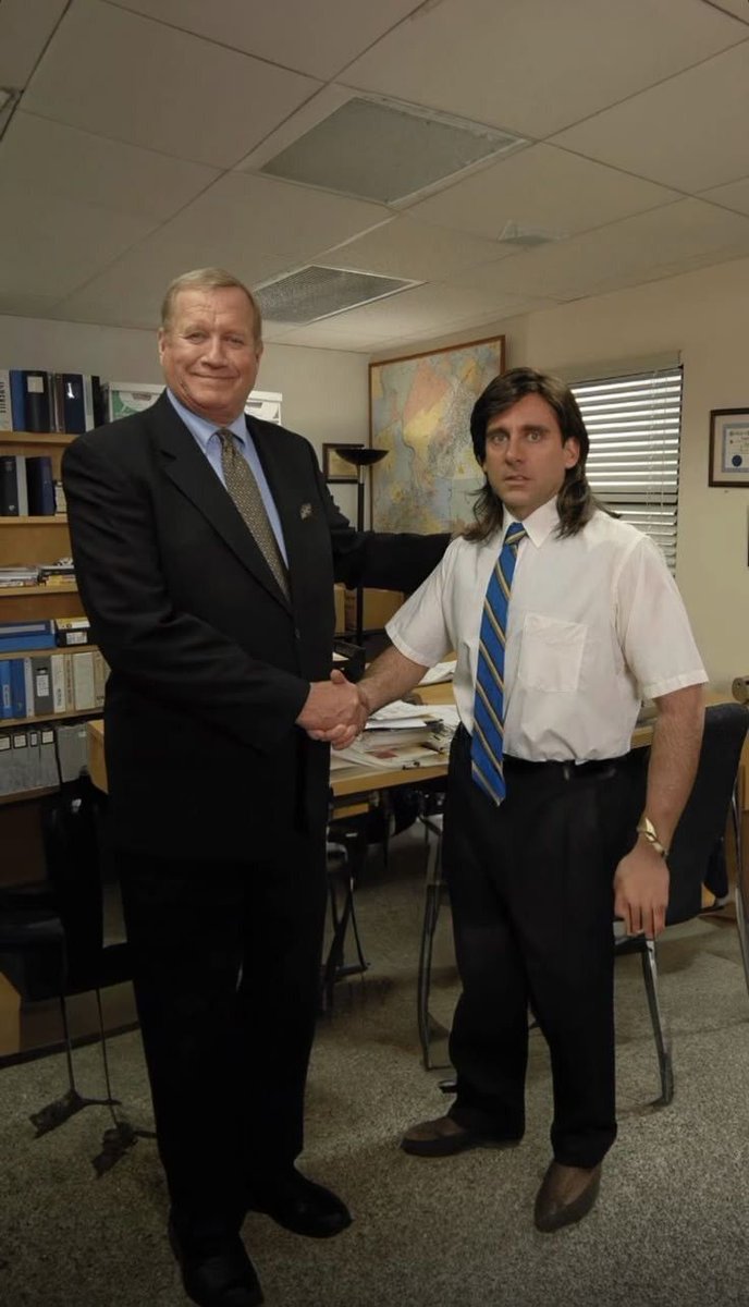 Two Men Shaking Hands in Office - Michael Scott Comedy Nano Banana提示词