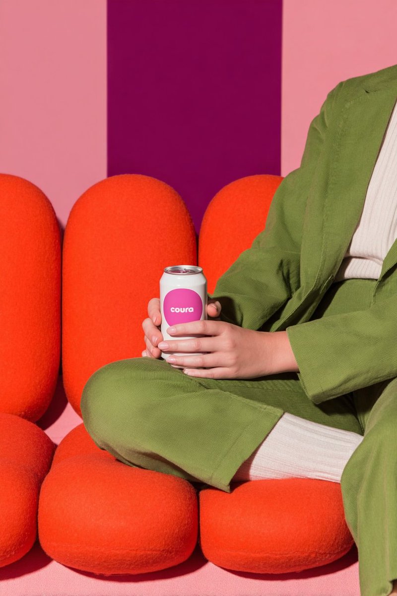 Product Photography: Modern Beverage Can in Colorful Interior Nano Banana提示词