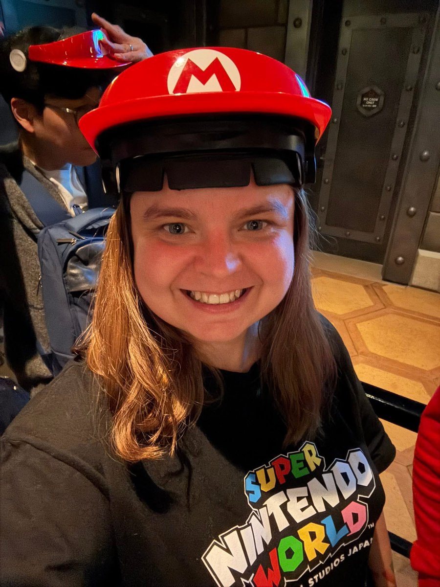 Happy Woman Mario Hat Super Nintendo World Portrait Nano Banana提示词