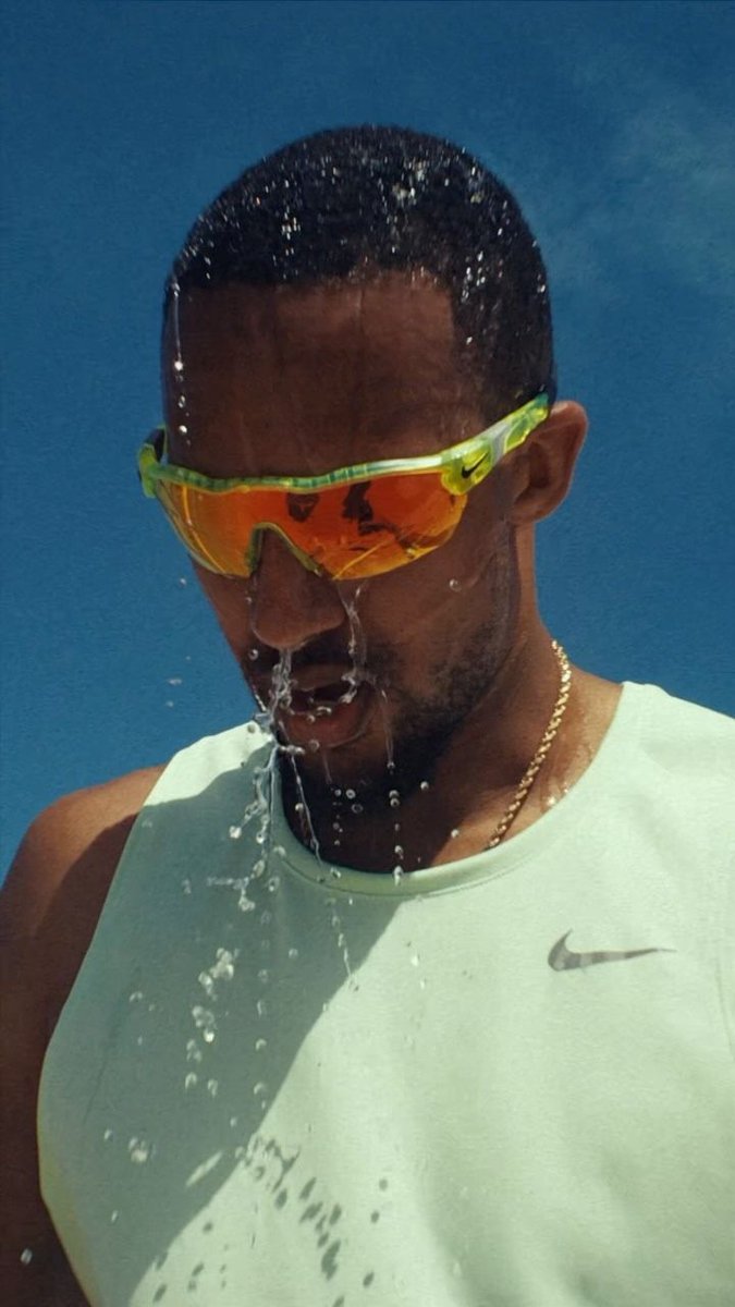 Athlete with Water Splash and Nike Apparel - Sports Action Nano Banana提示词