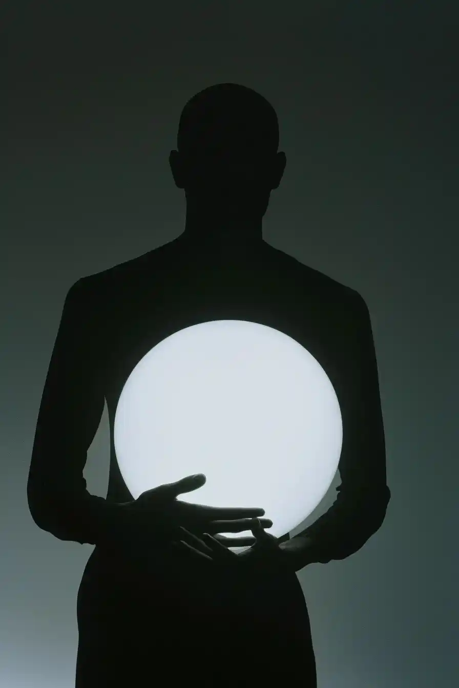 Silhouette Figure with Radiant Sphere Midjourney提示词